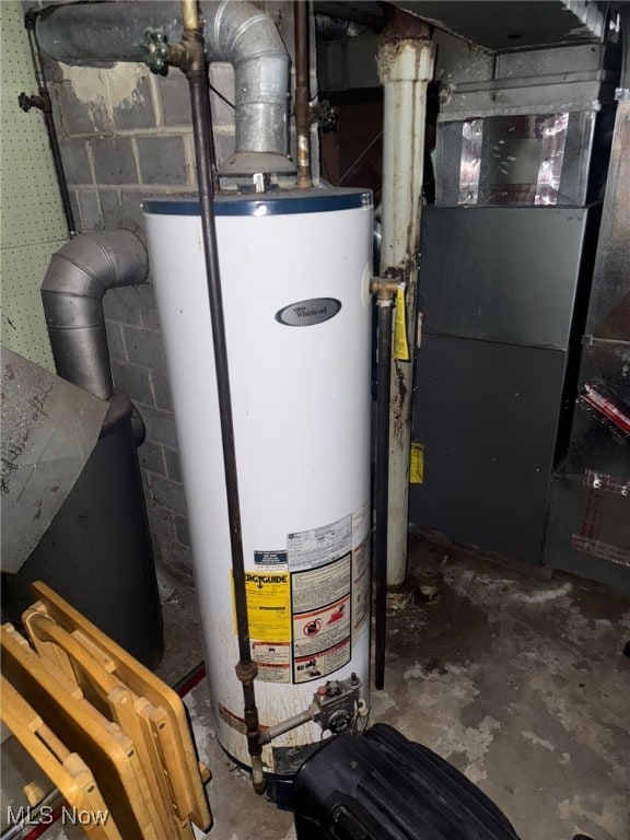 utilities with gas water heater and heating unit