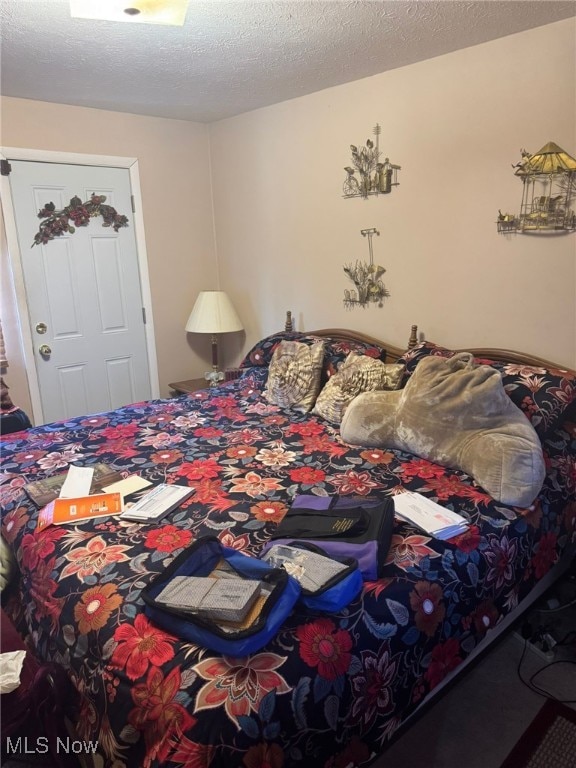 bedroom with a textured ceiling