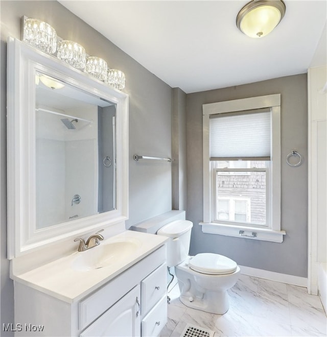 full bathroom with shower / tub combination, vanity, and toilet