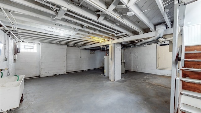 basement featuring gas water heater