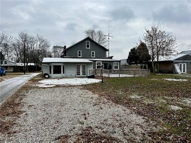 back of house with french doors