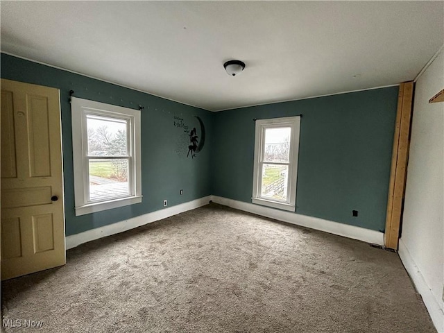 view of carpeted spare room