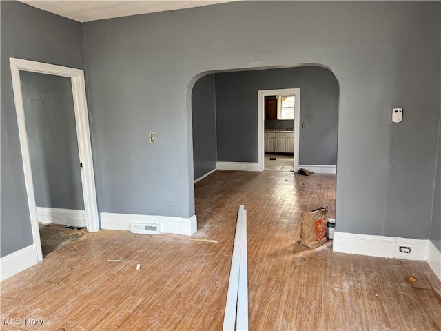 empty room featuring hardwood / wood-style floors