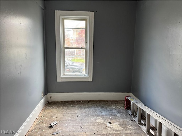 empty room featuring hardwood / wood-style flooring