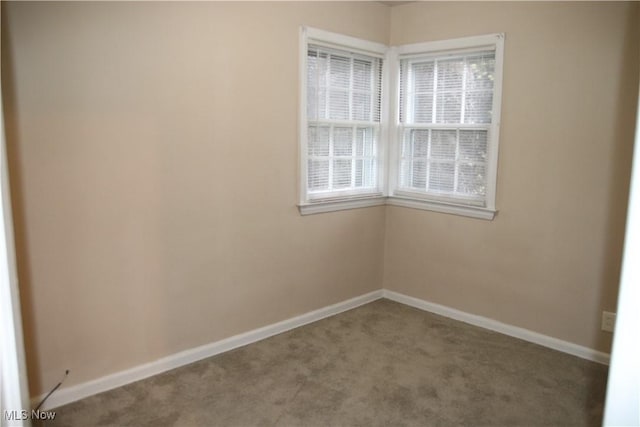 empty room featuring carpet