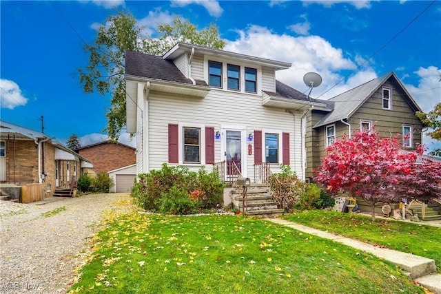 view of front of home featuring a front yard