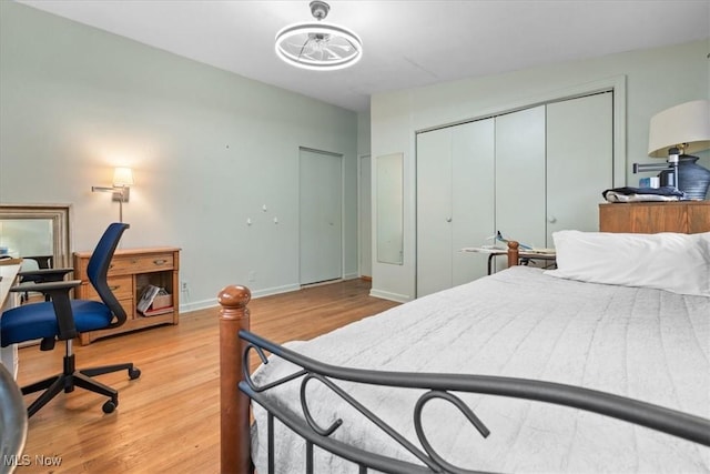 bedroom featuring light hardwood / wood-style floors and a closet