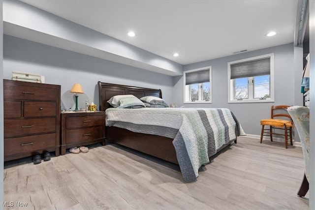 bedroom with light hardwood / wood-style floors