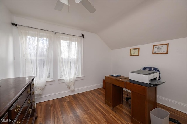 home office with dark hardwood / wood-style flooring, ceiling fan, and lofted ceiling