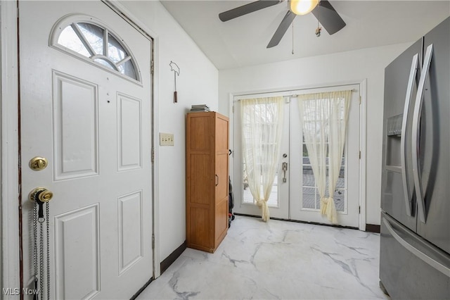 entrance foyer with french doors and ceiling fan