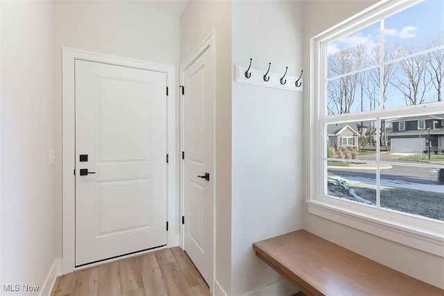 583 Iris Pl, Aurora, OH 44202 - mudroom featuring light wood-style floors and baseboards