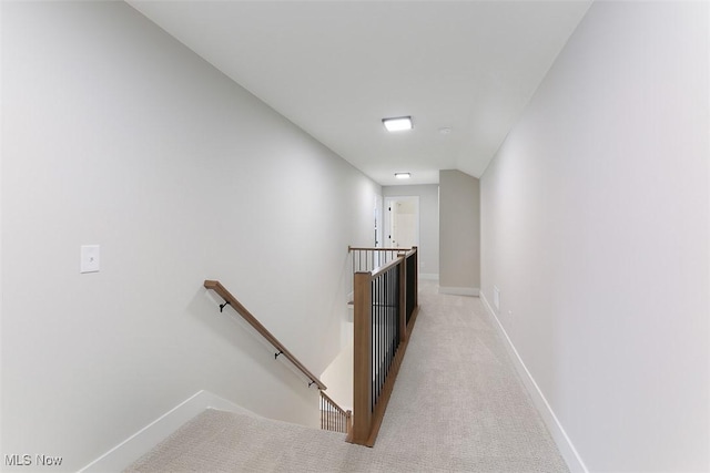 583 Iris Pl, Aurora, OH 44202 - hall featuring an upstairs landing and carpet flooring