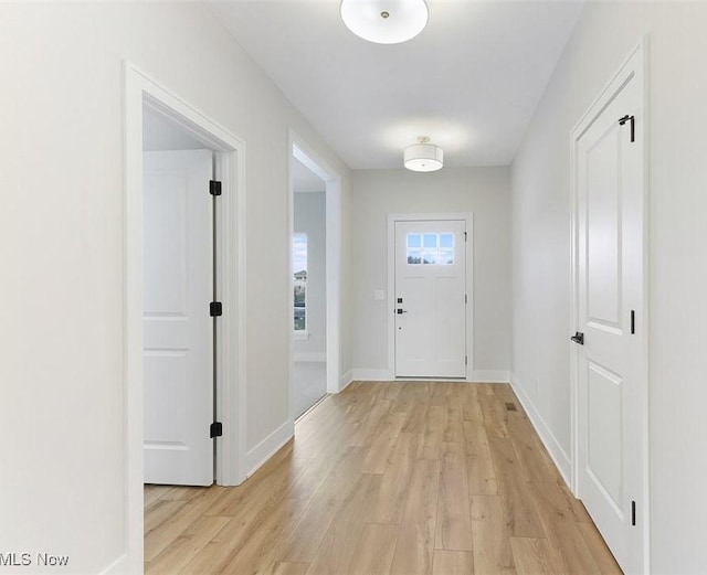 doorway featuring light wood-type flooring