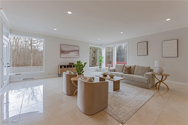 living room featuring plenty of natural light, light tile patterned flooring, and ornamental molding