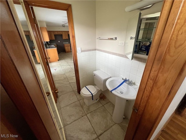 bathroom with tile patterned floors