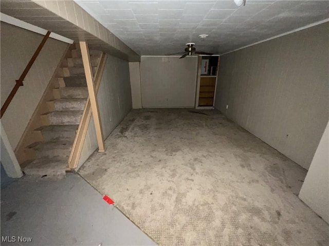 basement with ceiling fan