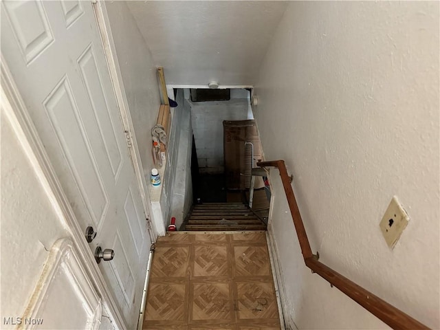 staircase with parquet floors