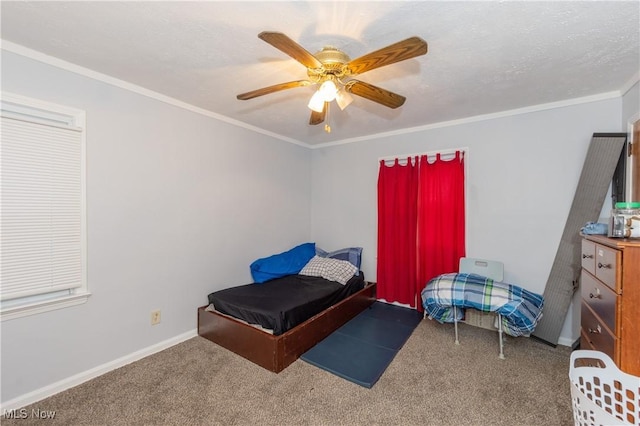 bedroom featuring ceiling fan, carpet, and ornamental molding