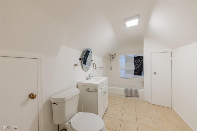 full bathroom featuring vanity, tile patterned floors, lofted ceiling, toilet, and shower / bathing tub combination