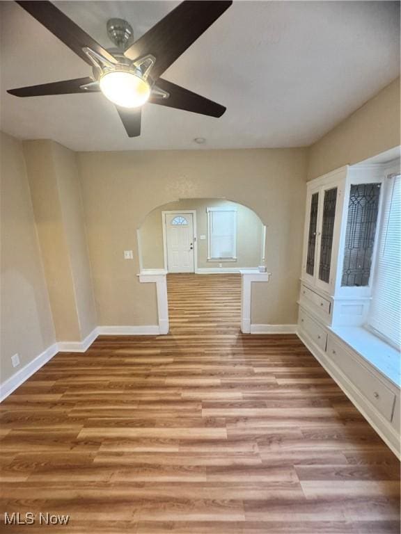 interior space featuring ceiling fan and light hardwood / wood-style flooring