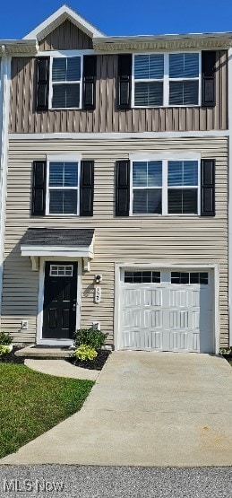 view of front of home with a garage