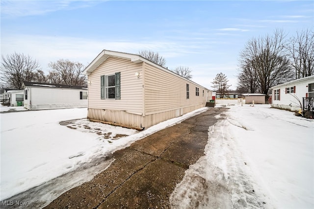 view of snow covered property