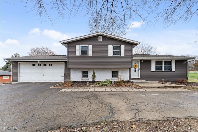 split level home with a garage