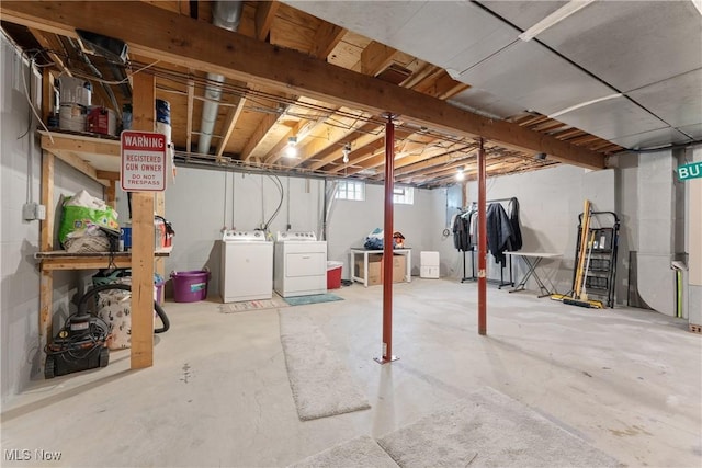 basement with washing machine and dryer