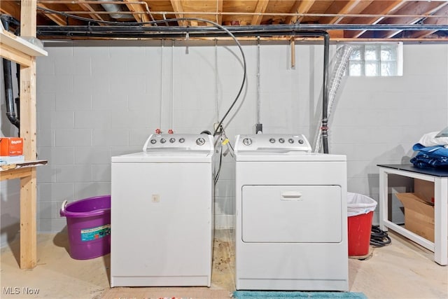 laundry area with washing machine and dryer