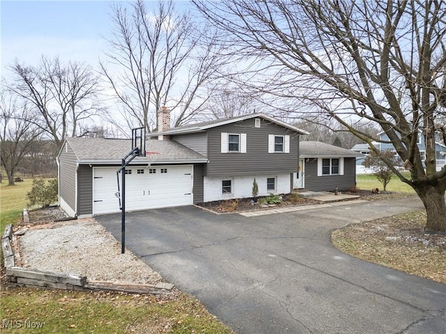 tri-level home featuring a garage