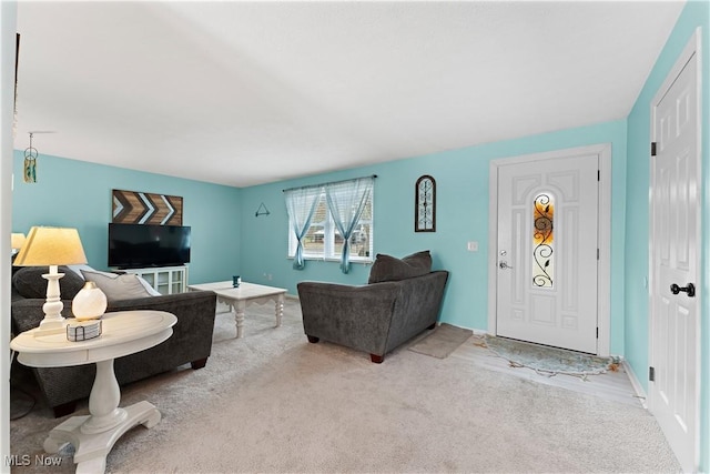 living room featuring light colored carpet