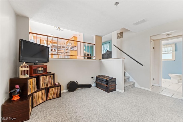 interior space featuring light colored carpet