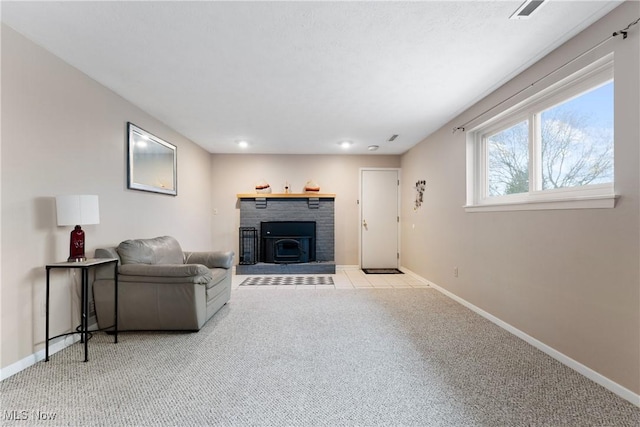 living room with light colored carpet and a brick fireplace