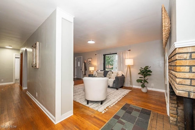 living room with dark wood-type flooring