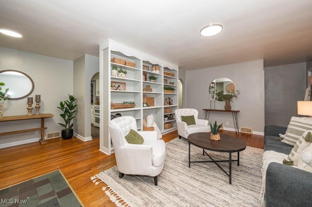 living area featuring hardwood / wood-style floors