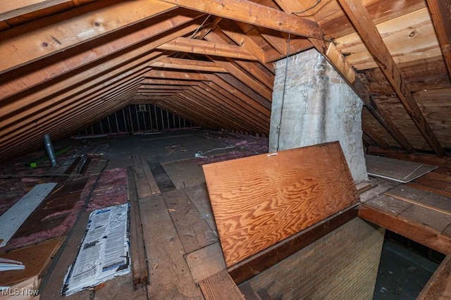 view of unfinished attic