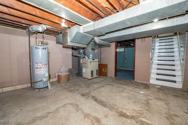 basement with gas water heater and heating unit