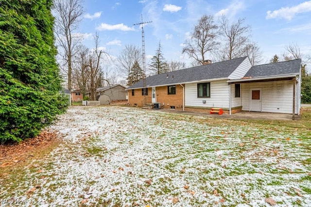 back of property featuring cooling unit and a patio area