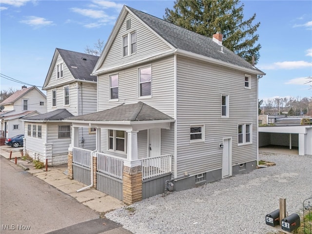 front of property featuring covered porch