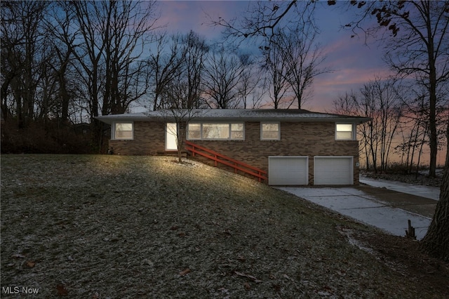 exterior space with a garage