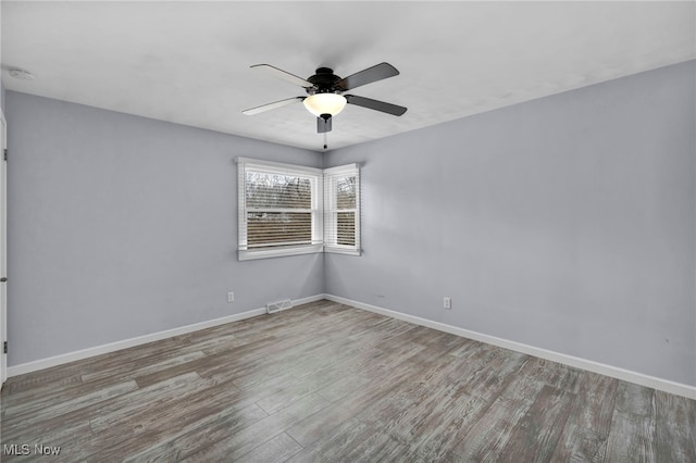 unfurnished room with ceiling fan and light hardwood / wood-style flooring