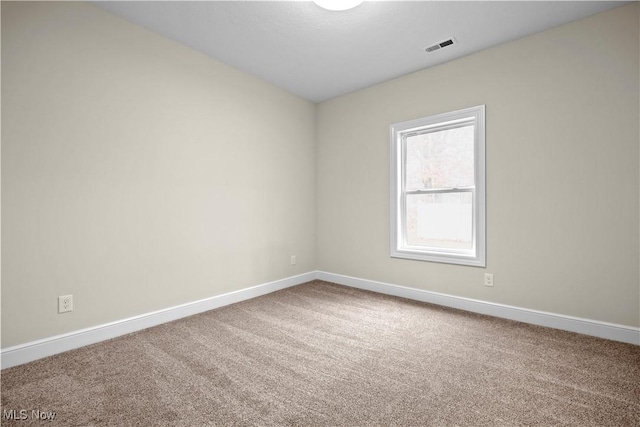 empty room with carpet floors