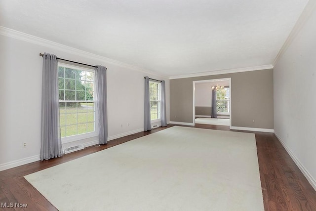 unfurnished room featuring dark hardwood / wood-style floors and crown molding