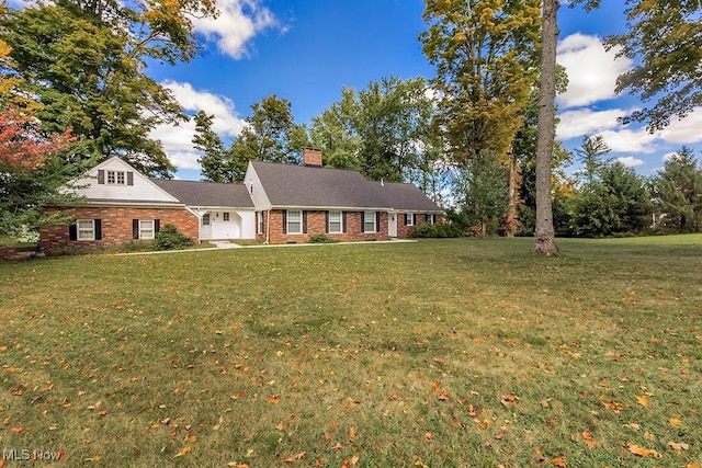 view of front of home with a front yard