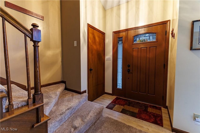 foyer with light hardwood / wood-style flooring