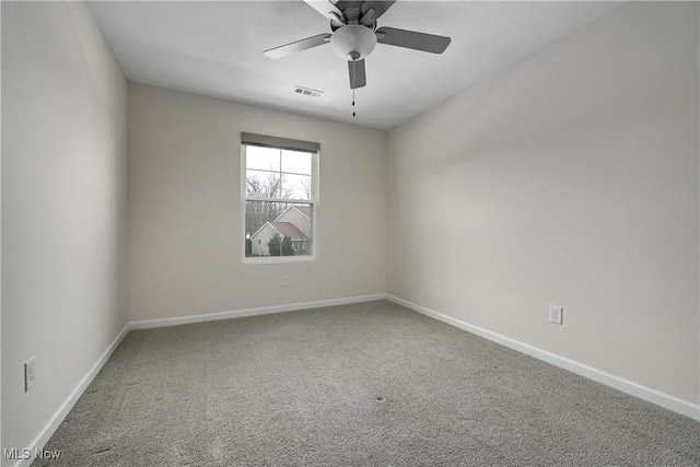 unfurnished room featuring carpet floors and ceiling fan