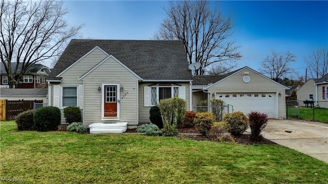 view of front facade featuring a garage and a front lawn