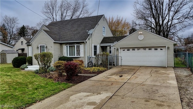 view of front facade featuring a garage and a front lawn