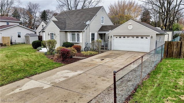 view of front property featuring a garage and a front yard