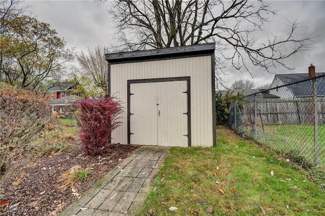 view of outdoor structure with a yard